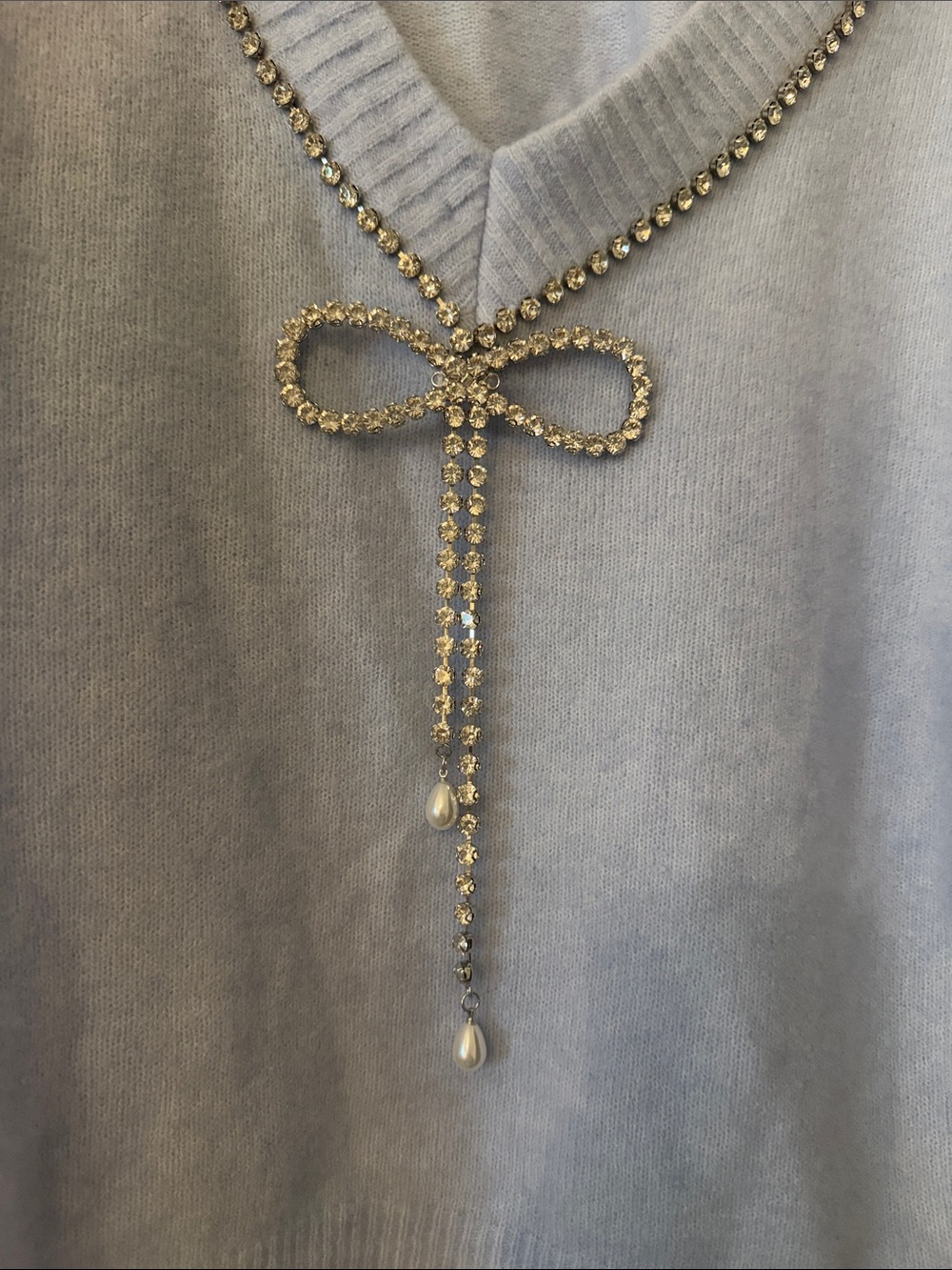 Express V-Neck Light Blue Sweater with Rhinestone Bow Accent - Picture 2 of 7